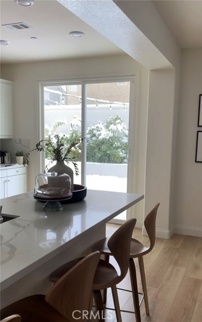 Glimpse of kitchen to backyard