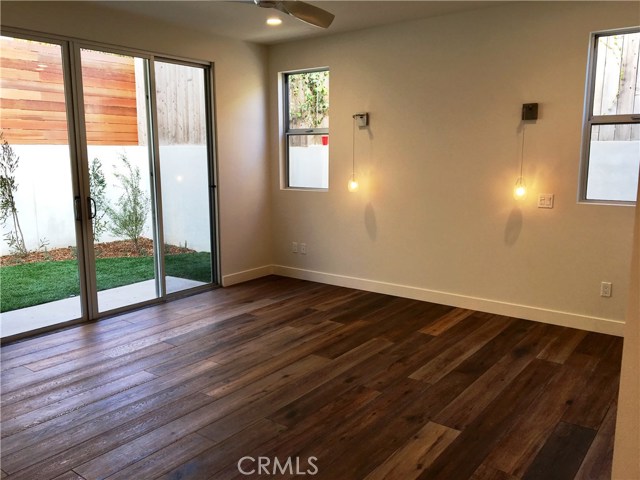 Master Bedroom opening to grassy yard.