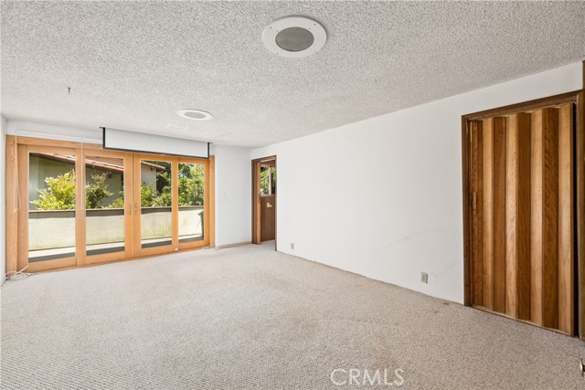 Family room connects to kitchen. Study and a laundry beyond.