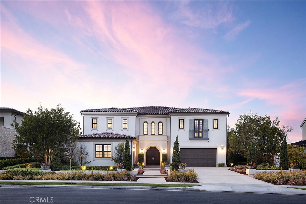 Perched atop the rolling hills of San Juan Capistrano, in the privately gated enclave of Tradewinds, in Pacifica, this home takes advantage of a large premier homesite by offering breathtaking, unobstructed views stretching across the valley and toward the mountains. A soaring two-story entry, flanked by a pair of floating staircases frames a light-filled loft and greets entrants with a sense of arrival. Inside, the home stuns with a dramatic open-concept layout and meticulously designed luxury finishes. The heart of this former model home is a gourmet kitchen featuring an oversized island with bar seating and food-prep nook, a large walk-in pantry and top of the line Wolf range and Sub Zero fridge—perfectly suited for everyday living and elevated entertaining. Outside, custom hardscape enhances a large zero-edge pool and spa, a covered outdoor living space, and a built-in bar with beverages on-tap, and BBQ area ideal for hosting gatherings outdoors. A distinguished guest suite on the main level offers privacy and versatility, ideal as a secondary bedroom or a refined home office and four additional upstairs suites offer private bathrooms, including a grand master suite with custom closet and attached laundry room. Throughout the home, smart home technology, designer upgrades, and seamless indoor-outdoor transitions define a lifestyle of ease and sophistication. Located only three miles from the beach and Dana Point Harbor, residents enjoy access to over a mile of scenic biking and equestrian trails, and are just a short walk to the private community clubhouse featuring a resort-style pool, spa, cabanas, BBQ area, fitness center, and more. On site RV parking is available via the HOA.