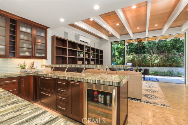 Shot from the kitchen to the Family room with direct and full access to the back yard for indoor-outdoor living