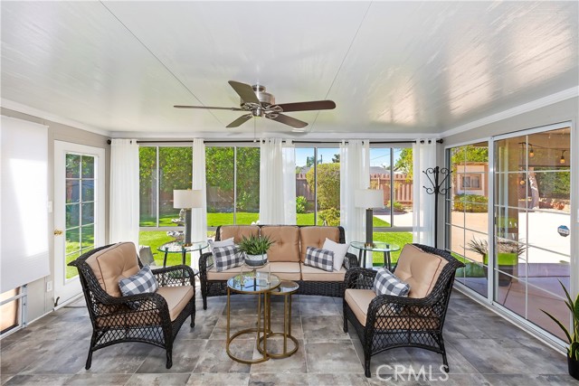 Sunroom - Surrounded by floor-to-ceiling windows, the sunroom is the perfect place to brighten your day no matter the weather outside.