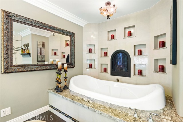 Tub with fireplace.