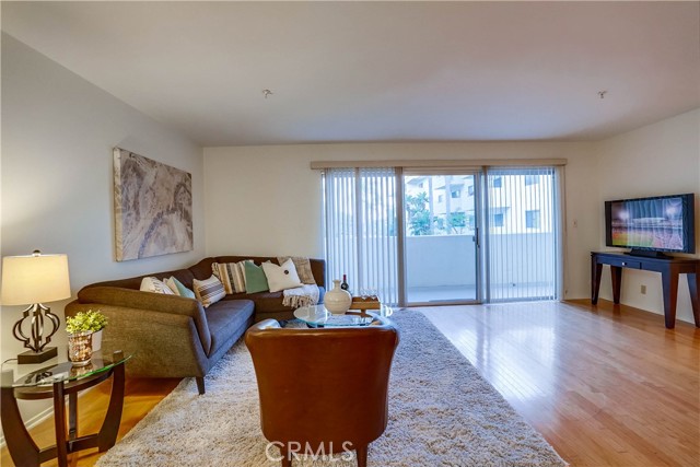 Inviting, large Living Room with slider onto deck overlooking pool. Inviting, large Living Room with slider onto deck overlooking pool.