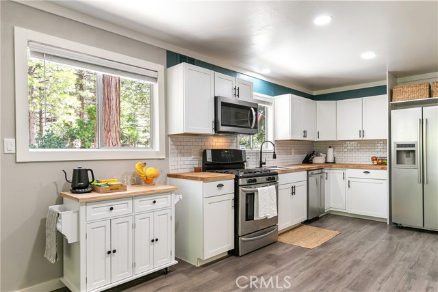 Updated kitchen with newer appliances and flooring