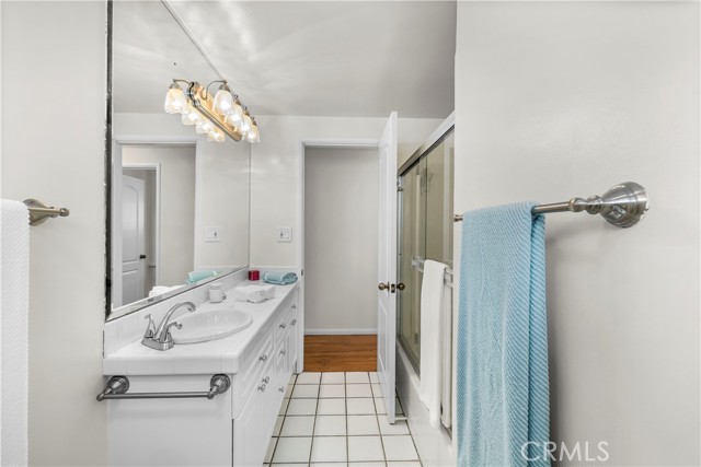 Hallway Full Bath. Also With Window And Plantation Shutters.