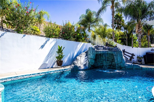 Pebbletec Pool with Water fall and slide feature