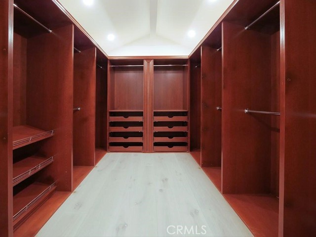 walk-in closet in master bedroom