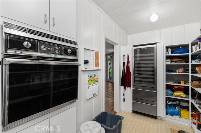 This pantry not only houses staples, it also has a large wine and beer cooler, and a 2nd oven.