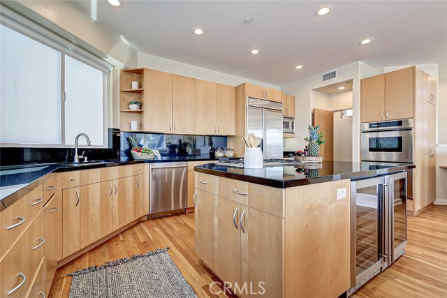 Incredible cabinet space and plenty of entertaining room in this chef's kitchen.