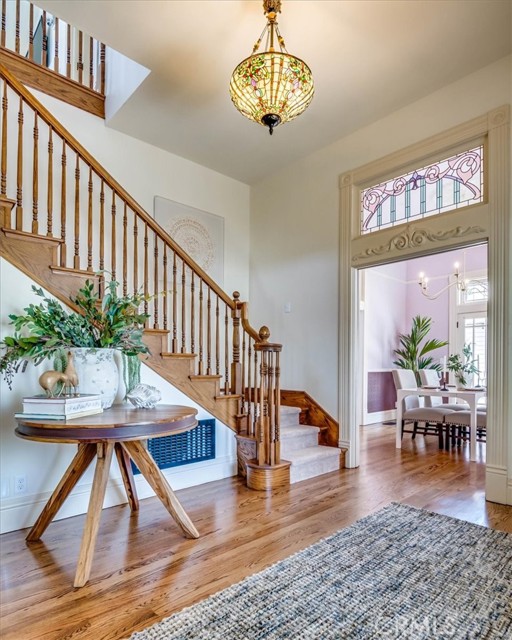 Newly refinished hardwood floors and carpet.