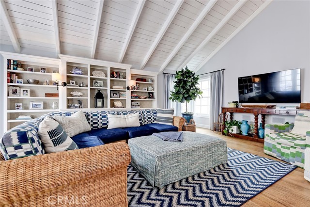 Family Room with custom built-ins and vaulted ceilings