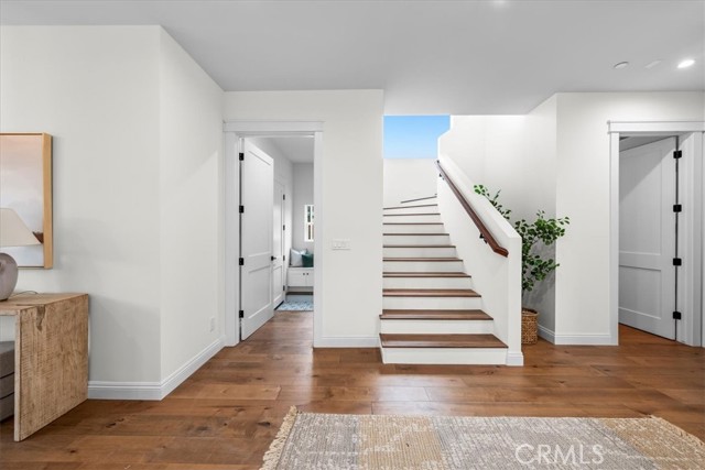 Mudroom attached to garage, and 1/2 bathroom.