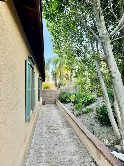 Side yard beautifully landscaped