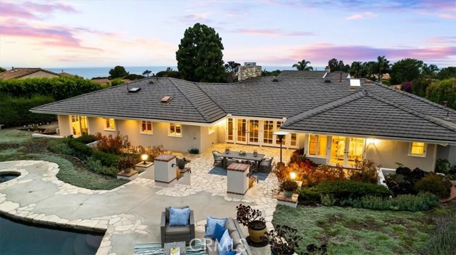 Aerial view of back of house, located 3 houses from the bluffs.