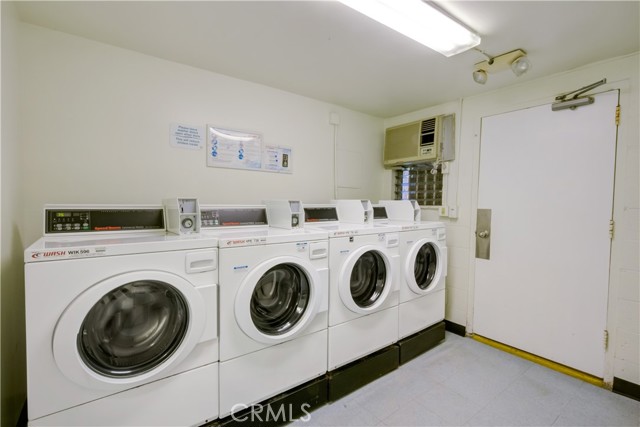 Laundry room is on the ground floor just by the elevator.