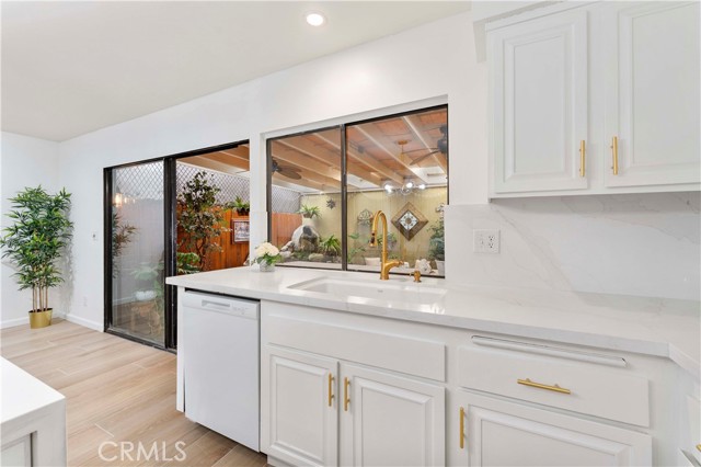 Kitchen with entry to private patio