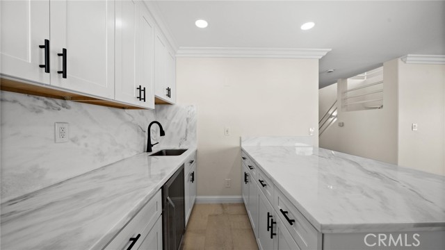 Wet Bar with under cabinets LED lights under cabinets, beverage/Wine Cooler and bar counter.