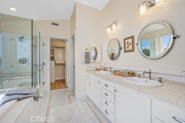 Large soaking tub in main bedroom. Very large walk-in closet. Separate shower