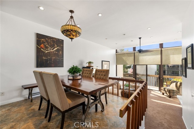 This spacious dining room is great to enjoy a meal together!