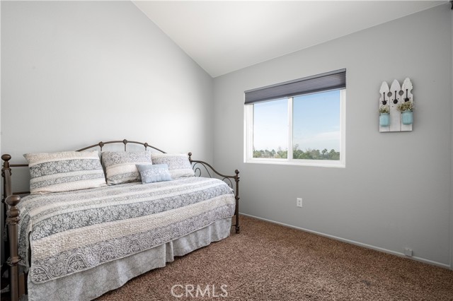 #3 secondary bedroom with vaulted ceiling.