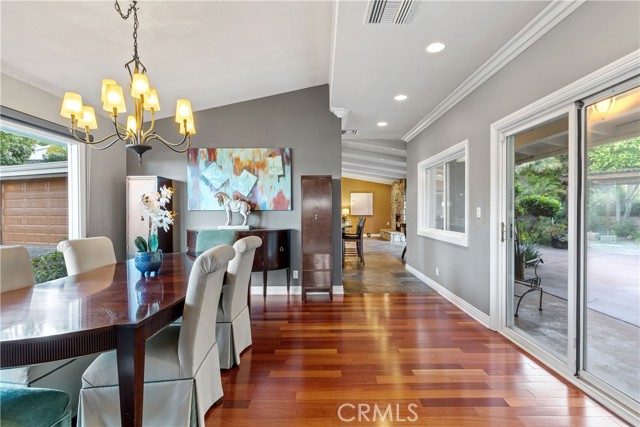 The formal dining room is a wonderful space with tall picture windows providing an elegant setting for your formal dining and entertaining.