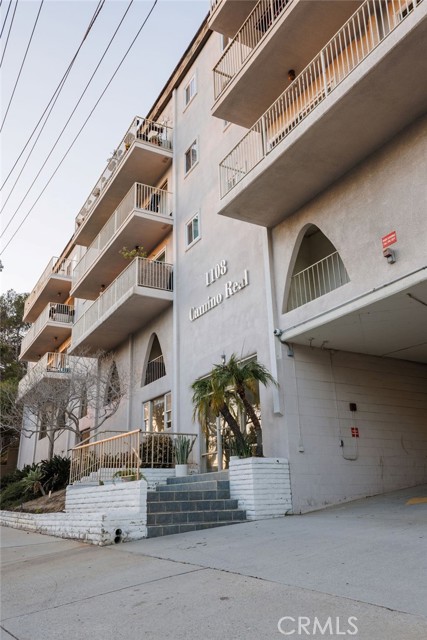 High Pointe Condominium facade with ramp to the secured parking garage
