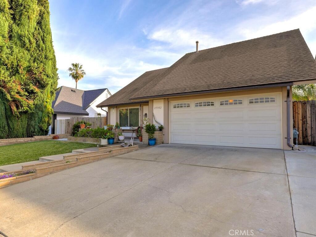 More than just a house and a great location. Inviting front entry with patio to sit out front and talk to the neighbors or have potted plants and a place to enjoy the morning sun. Entering inside the floorplan has a kitchen that is open to the outside covered patio where there is a place to dine and BBQ and acts as an extension to the living space as it is private and covered from all types of weather. Family room with fireplace and a entrance to the other side of the yard and an additional covered patio - extending the home and bringing the outside into usable space protected from the elements.  Windows and sliding doors are newer.  Newer AC. too! The yard is large and big enough to add a pool if desired.  4 bedrooms upstairs offers a space for office or exercise.  The home is located about a half mile from bakeries, restaurants offering take out or outdoor dining, shops and the 5 Freeway is just a stone's throw away.  Around the corner is a park and close by schools.  This is a secluded nook of a neighborhood and a highly sought area of Laguna Hills.