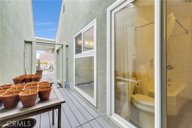 Atrium outside two bathrooms provides privacy