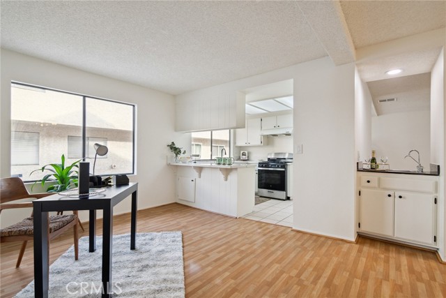 Family room with view of kitchen