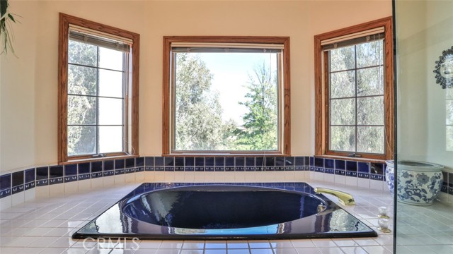 Enjoy the outside while you soak in your spacious tub