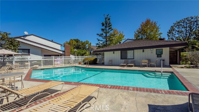 Pool view with clubhouse
