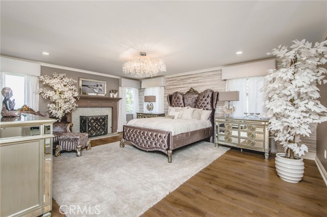 Primary Suite with fireplace, sitting area and ocean views. Primary Suite with fireplace, sitting area and ocean views.