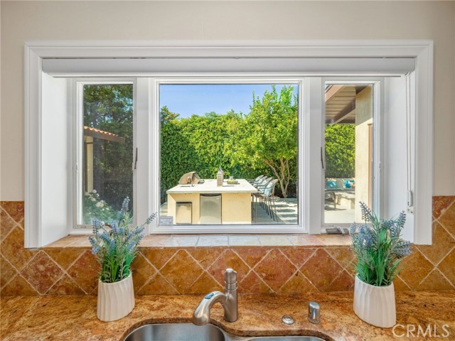 kitchen window out to rear patio