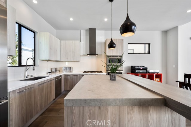 Modern kitchen with island and bar seating