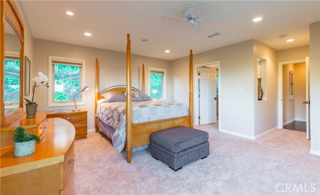 Serenity awaits in the master bedroom suite with walk-in closet.