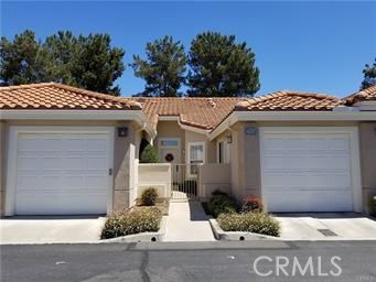 Located in the premier guard gated senior community of Palmia. Awesome one story featuring 2 bedroom, 2 bath. Open kitchen with eat in area. Large living/dining room with gas fireplace. Master bedroom has ceiling fan, sliding door to rear patio, walk in closet, no threshold shower for easy access. Two Car Garage. Peaceful Patio with beautiful flowers and rose bushes and Wood Patio Cover. The Courts homes have their own Pool & Spa in addition to the Main Clubhouse featuring Pool, Spa, 18-hole Putting Green, Tennis Courts, Bocce, Shuffleboard, Fitness Room, Library, Card rooms, Clubs, Group Excursions, etc. Palmia Residents are also HOA members to Mission Viejo Lake where you can enjoy the beach, picnicking, boating, fishing and summer concerts. Washer and Dryer included.