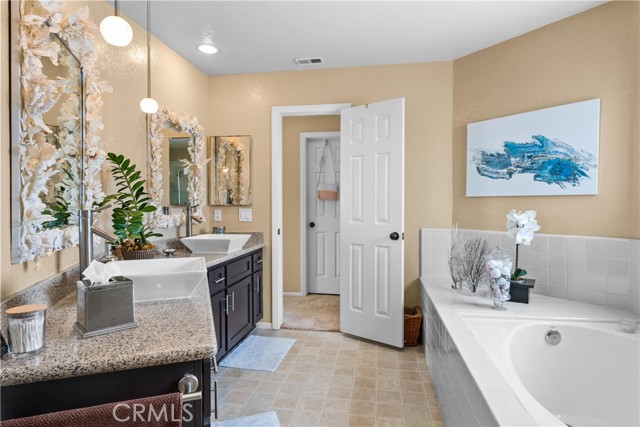 Primary Bathroom with custom mirrors and lighting
