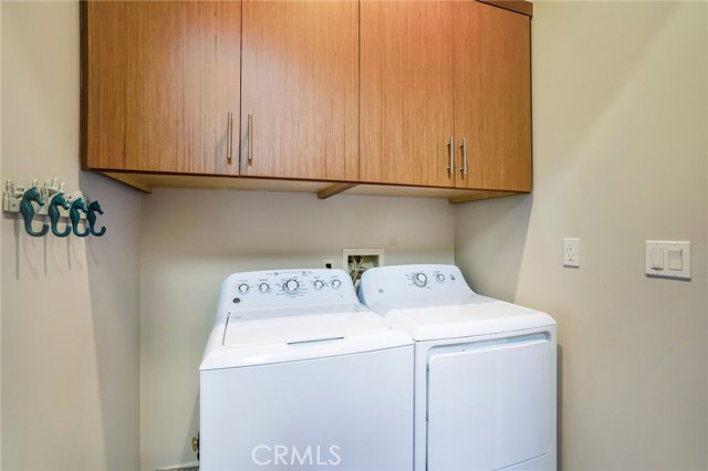 Separate laundry room downstairs.
