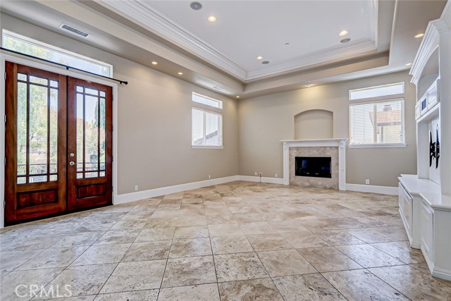 Charming french doors that lead to the rear enclosed yard and entertaining area create an open indoor/outdoor feeling we all treasure.