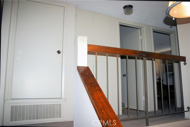 Primary bedroom on the left of the landing and two bedrooms on the other side.