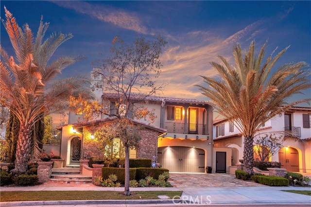 35 Momento Irvine, California Spectacular Renovated View Home at one of highest points in Quail Hill! Highly sought after Vicara gorgeous remodeled and expanded plan 3 estate located high in prestigious Quail Hill adjacent to Shady Canyon rolling hills. Panoramic City Lights views over 5 cities w/ Disneyland fireworks seen nightly from your back yard! This home offers over 5000 SF of space w/ 5 Bedrooms, 6 baths. Fully Pre-paid lease on solar panels. Rich custom designer tasteful touches throughout the home. Expanded bedrooms, 2 added bathrooms, custom cabinets and built-ins, pocket doors, multiple french doors to bring in natural light. Formal living & dining room perfect for entertaining! Popular downstairs bedroom w/ full bath. Expanded & removed walls for open downstairs. Elegant Family Room open to Gourmet kitchen with oversized island with countertop seating and high end appliances. Sweeping wrought iron staircase leads to 2 additional bedrooms, expanded upstairs loft, media room and "his" office. Generous sized master suite w/French doors opening to oversized balcony. Spa-like master bath w/ spacious master closet w/ expanded spa shower & yoga room or gym. Enjoy Custom pool and spa in dream back yard w/covered patio, built-in outdoor firepit, w covered seating to enjoy the breathtaking views. Quail Hill community offers 3 Olympic swimming pools, hiking/biking trails, gym room, & sport courts, award-winning Irvine Unified school district & near world class shopping and entertainment & Laguna Beach!
