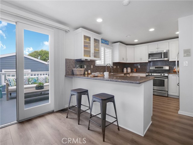 Kitchen/Door to Large Balcony