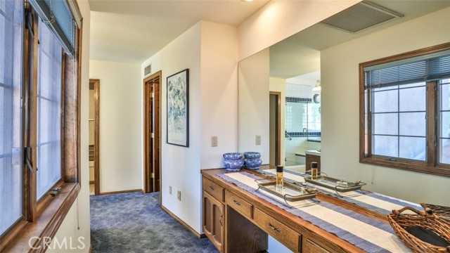 Hallway from the bedroom to the very large walk-in closet and bathroom