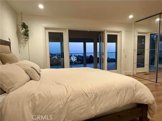 Guest Bedroom Opening to Expansive Ocean-View Terrace