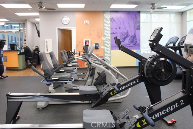 Hit the gym and hire a personal trainer.