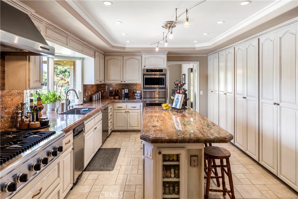 6 floor to ceiling Pantry Cabinets all with Heavy Duty Slides for Pull out Drawers.