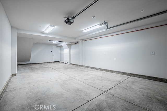 Tandem Garage with access to multi-use room.