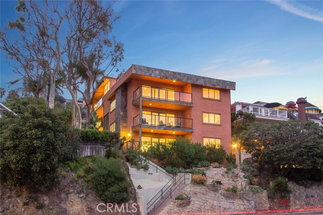 2442 S Coast Highway Laguna Beach, California Whether you’re searching for an ideal investment, tax advantages, a chic beach getaway or all of that and more, this fashionably remodeled 8-residence property on South Coast Highway in Laguna Beach is ready to enrich your life. Go in with friends and family, keep a few units for yourself and rent the rest, make one your perfect ocean-side hideaway or rent them all and reap the rewards...the choice is all yours. Panoramic ocean and Catalina Island views amp up the beauty of every residence—each offering its own unique character through an array of high-end features that vary by unit. Open floorplans showcase large balconies or expansive rooftop decks, hardwood flooring, contemporary fireplaces, new windows and glass doors, water- and energy-saving washer and dryer sets, jetted bathtubs, walk-in closets, Noritz instant hot water systems, and state-of-the-art wiring for full HDTV, surround sound, home automation and security systems. Each apartment is centered around a sleek kitchen with island, a variety of solid-surface and stone countertops, high-end appliances and new cabinetry. The property boasts easy access to beautiful beaches and coves, restaurants and shops, parks, hiking trails, and luxe hotels including Montage Resort & Spa.