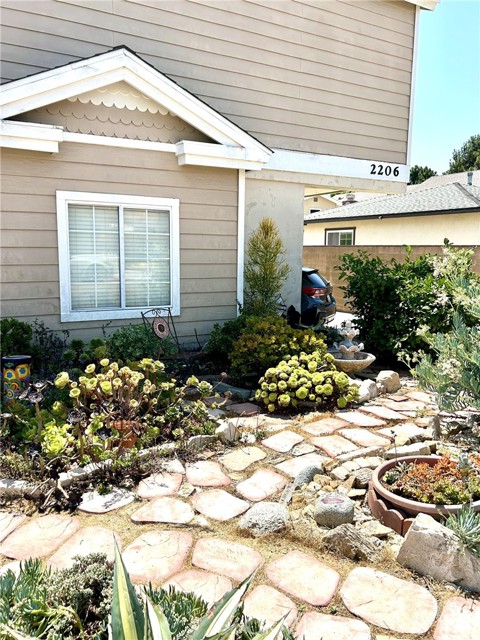 succulent garden in front of complex